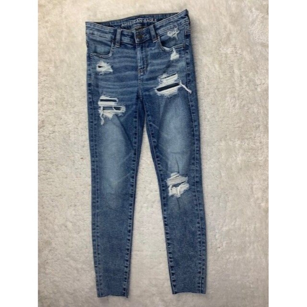 American Eagle Size 0 R Womens Jeans Jegging Mid Rise Distress Skinny Raw Hem